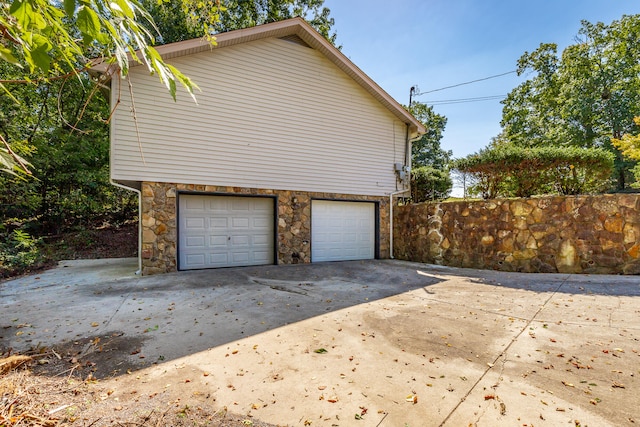 view of home's exterior with a garage