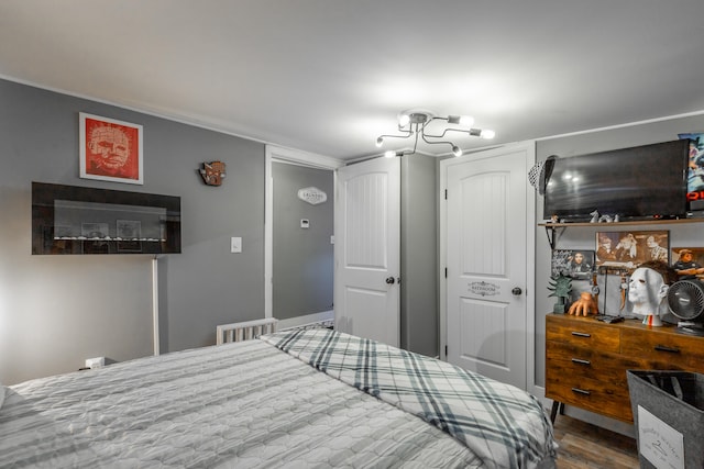 bedroom featuring hardwood / wood-style floors