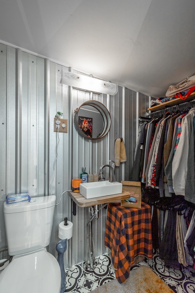 interior space featuring toilet and sink