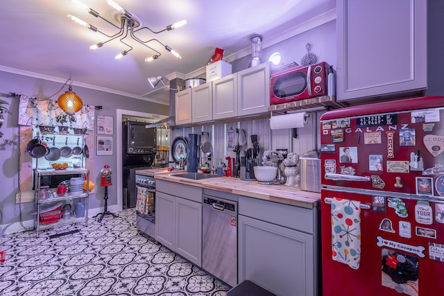 kitchen featuring wood counters, stainless steel dishwasher, fridge, gray cabinets, and crown molding