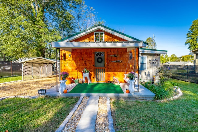 view of outdoor structure with a lawn