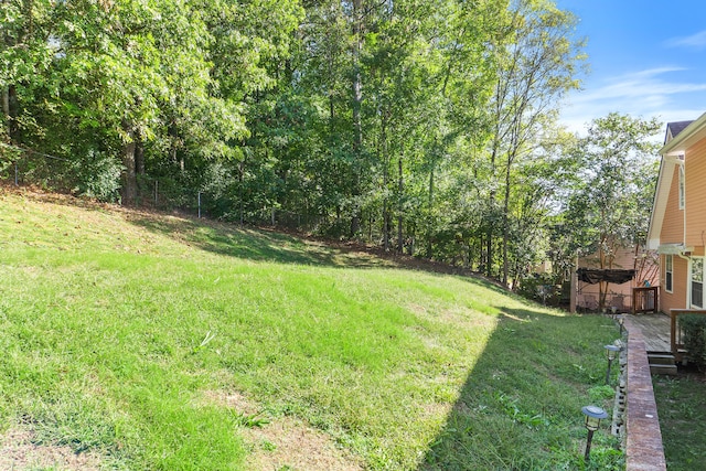 view of yard featuring a deck