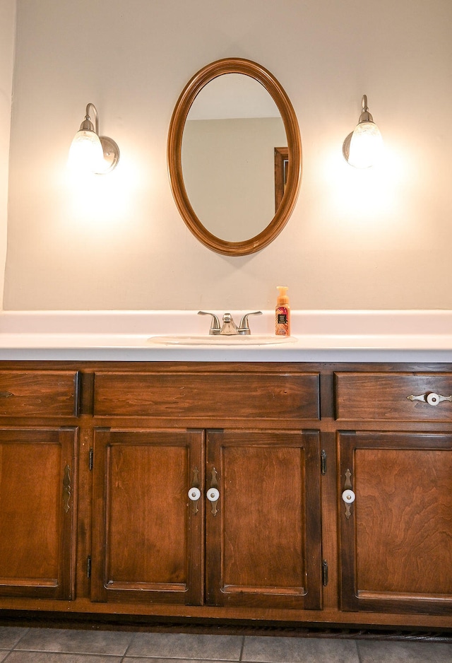 bathroom with vanity and tile patterned flooring