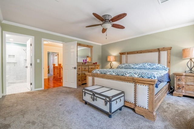 carpeted bedroom with crown molding, ensuite bath, and ceiling fan