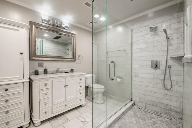 bathroom with vanity, a shower with shower door, toilet, and crown molding