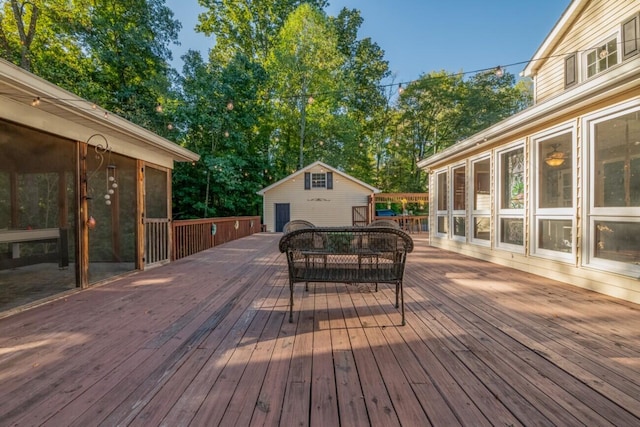 wooden terrace with a sunroom