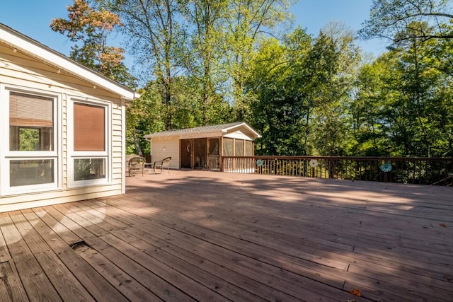 deck with an outbuilding