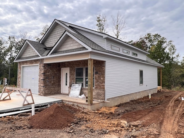 view of front of home featuring a garage