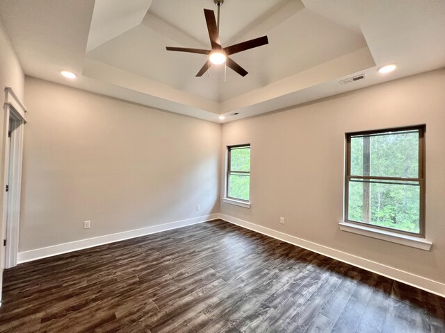 60 Ables Way, Ringgold, GA 30736 - empty room featuring a tray ceiling, dark wood finished floors, ceiling fan, baseboards, and recessed lighting