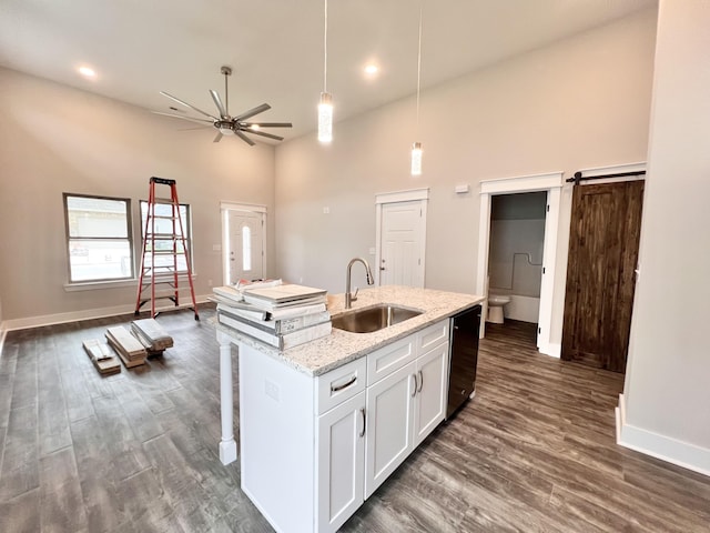 60 Ables Way, Ringgold, GA 30736 - kitchen with a sink, a towering ceiling, baseboards, dishwasher, and white cabinetry