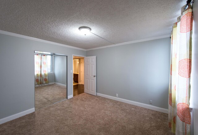 unfurnished bedroom featuring crown molding, a closet, and a textured ceiling