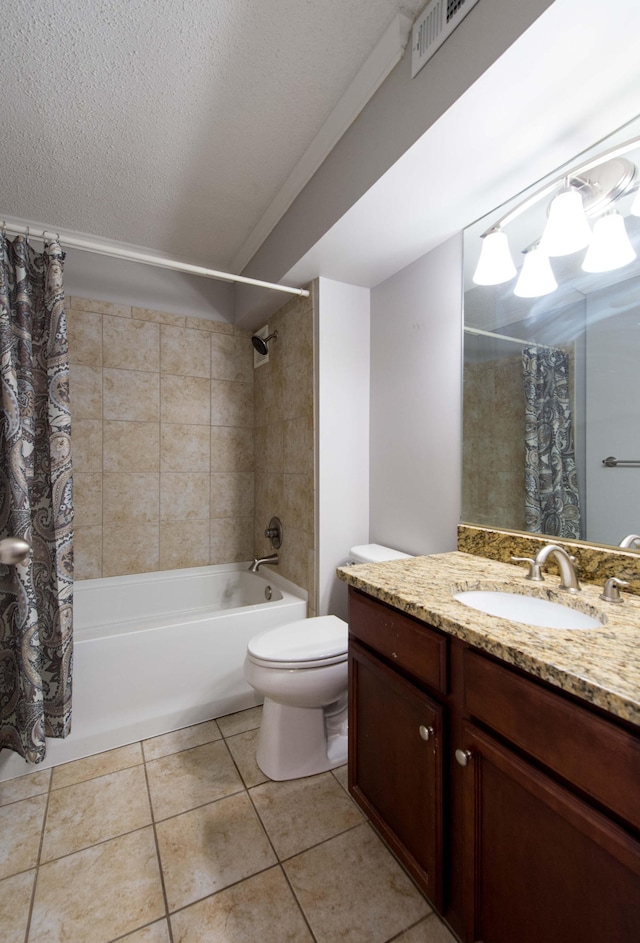 full bathroom featuring tile patterned flooring, shower / bath combination with curtain, a textured ceiling, toilet, and vanity