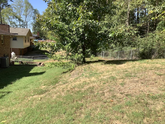 view of yard with central AC