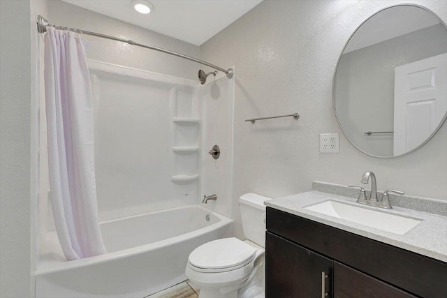 full bathroom with shower / bath combination with curtain, vanity, and toilet