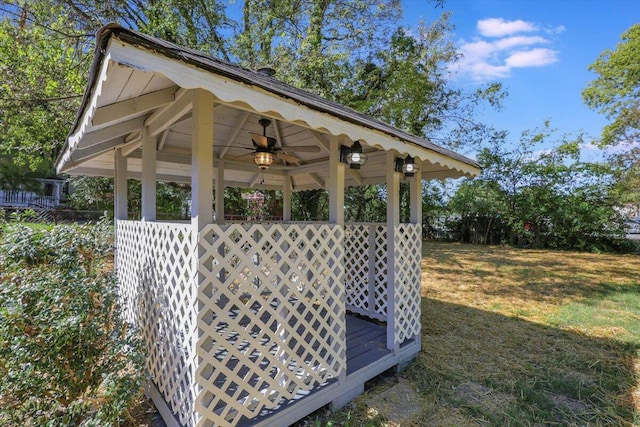 view of home's community with a gazebo and a yard