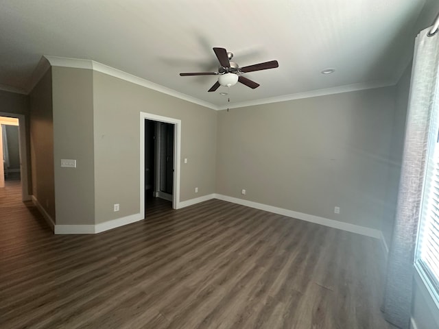 unfurnished room with crown molding, ceiling fan, and dark hardwood / wood-style flooring