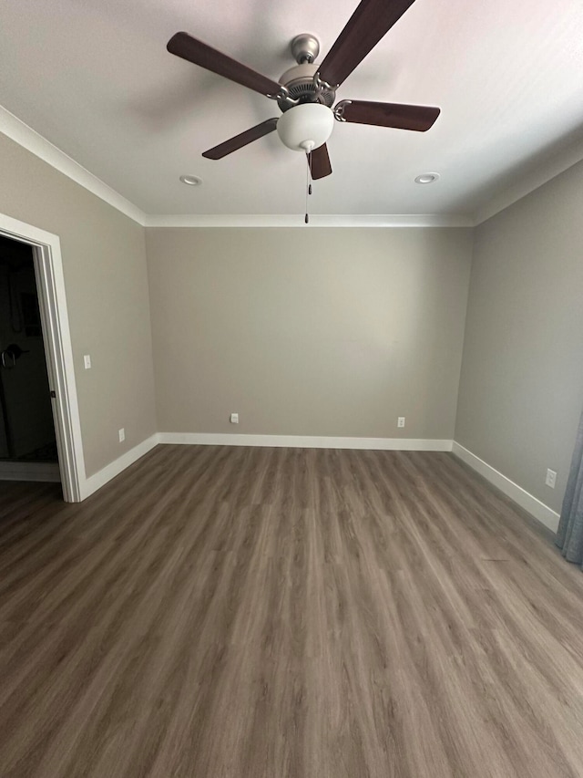 unfurnished room featuring wood-type flooring, ornamental molding, and ceiling fan