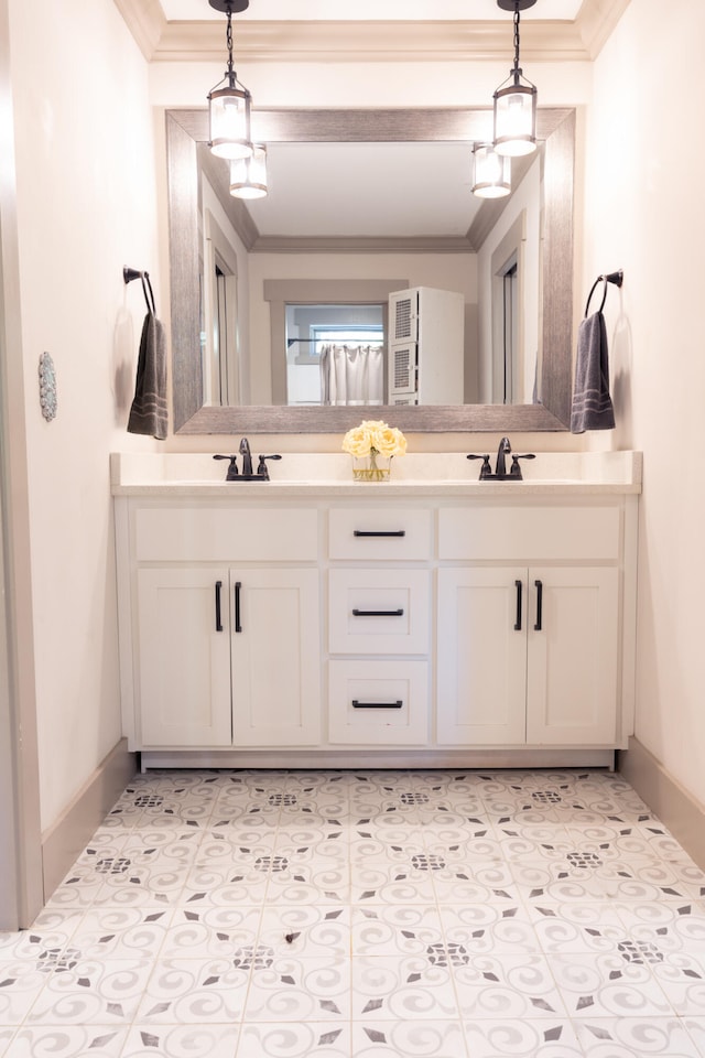 bathroom featuring vanity and ornamental molding