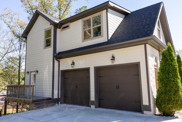 view of property exterior featuring a garage