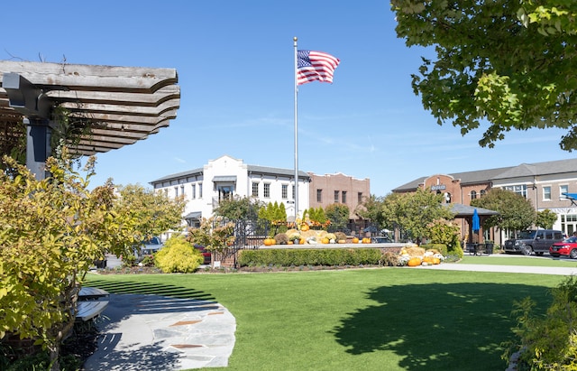 view of community featuring a yard