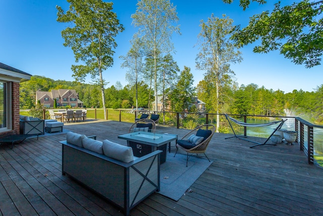 deck featuring outdoor lounge area