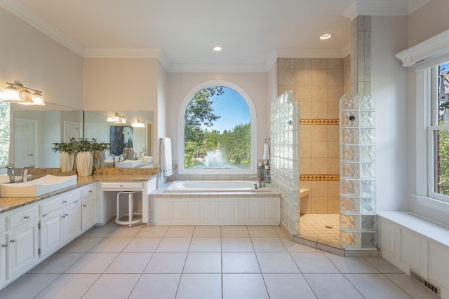 bathroom with vanity, crown molding, shower with separate bathtub, and plenty of natural light