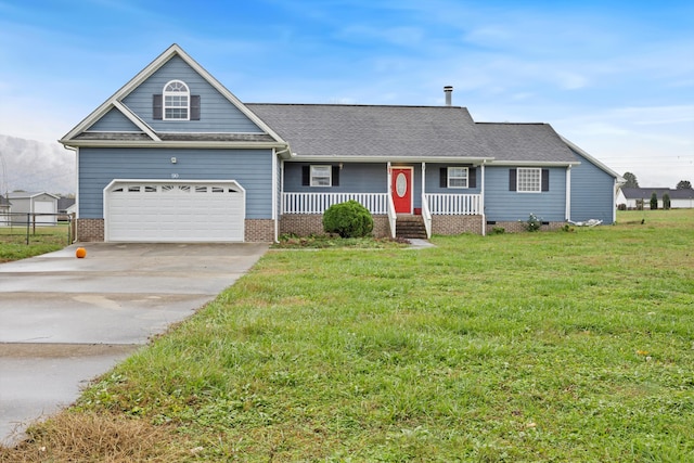 view of front of property with a front lawn and a garage