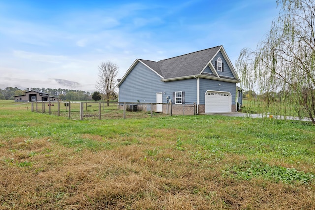 view of side of property featuring a lawn