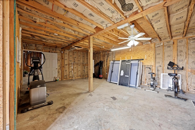 basement with ceiling fan