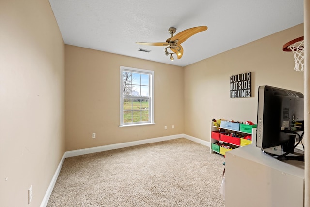 recreation room featuring carpet and ceiling fan