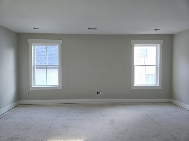 spare room with a wealth of natural light