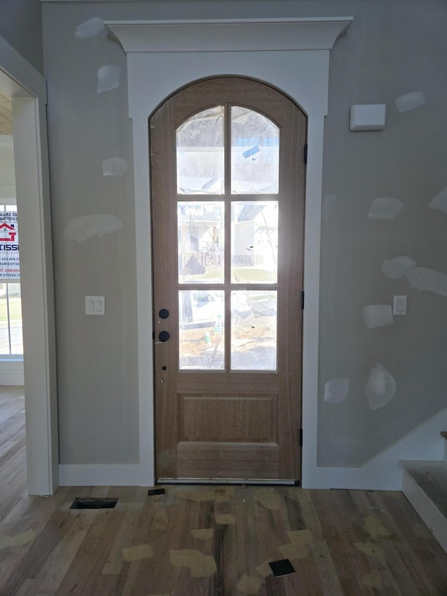 doorway to outside featuring hardwood / wood-style floors