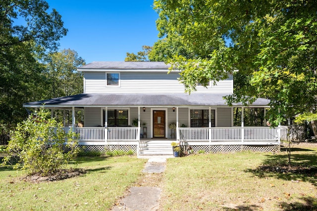 farmhouse featuring a front lawn and a porch