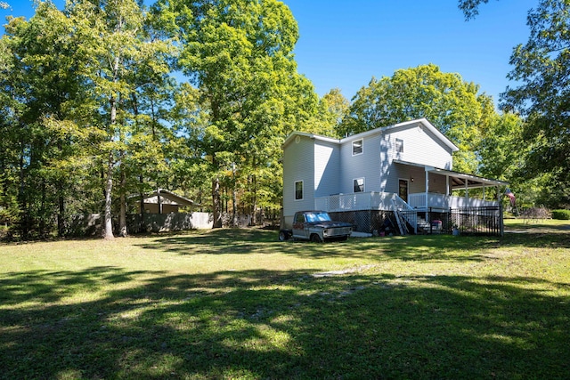 view of yard featuring a wooden deck