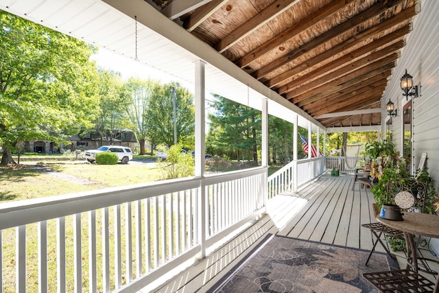 wooden terrace featuring a porch