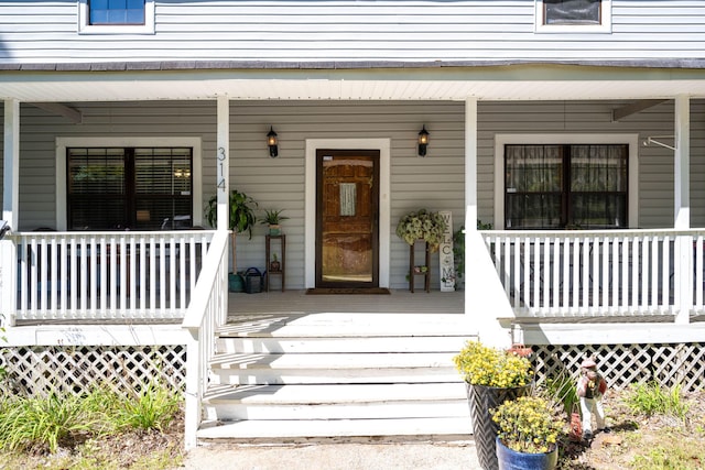 entrance to property with a porch