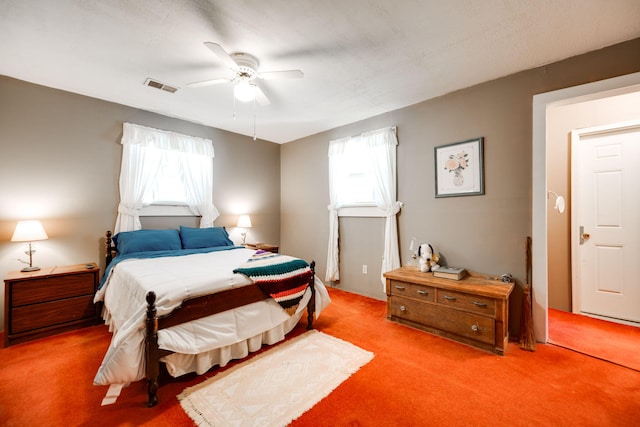 bedroom with light colored carpet and ceiling fan