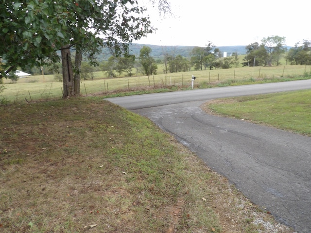 view of road with a rural view