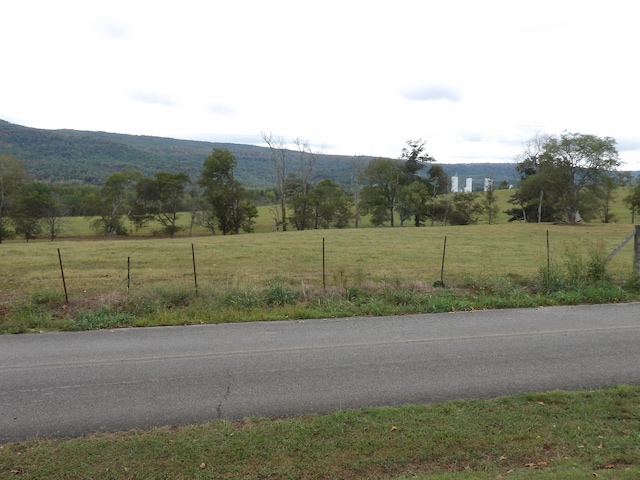 property view of mountains featuring a rural view