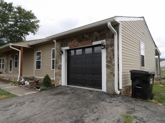 view of home's exterior with a garage