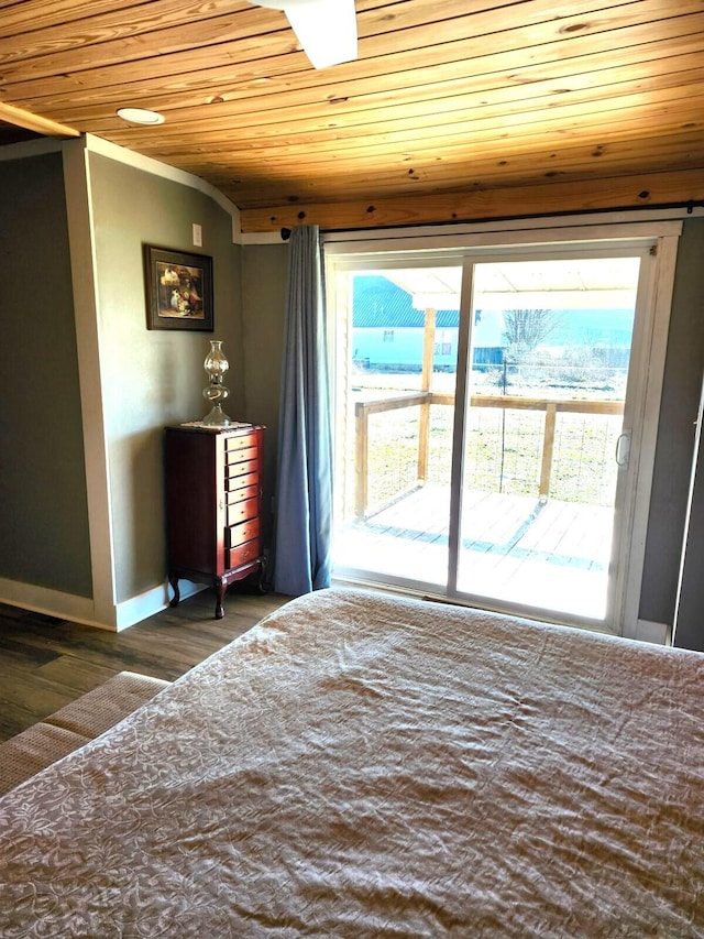 interior space with vaulted ceiling, wood ceiling, and dark hardwood / wood-style floors