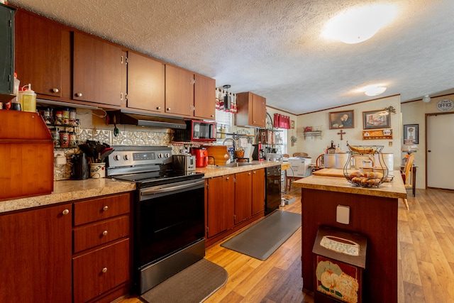 kitchen with light hardwood / wood-style floors, sink, ornamental molding, black appliances, and a textured ceiling