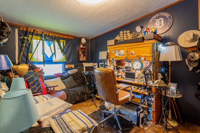 home office with crown molding, wood-type flooring, and a textured ceiling