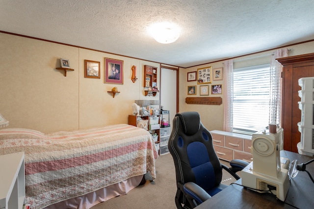 carpeted bedroom featuring a textured ceiling