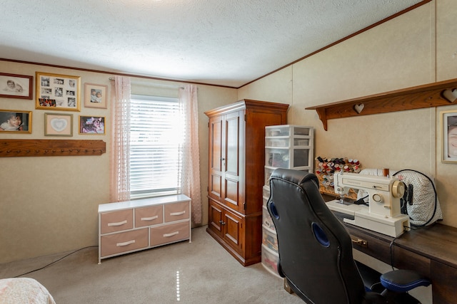 carpeted home office featuring a textured ceiling and ornamental molding