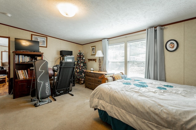 carpeted bedroom with ornamental molding, a textured ceiling, and vaulted ceiling