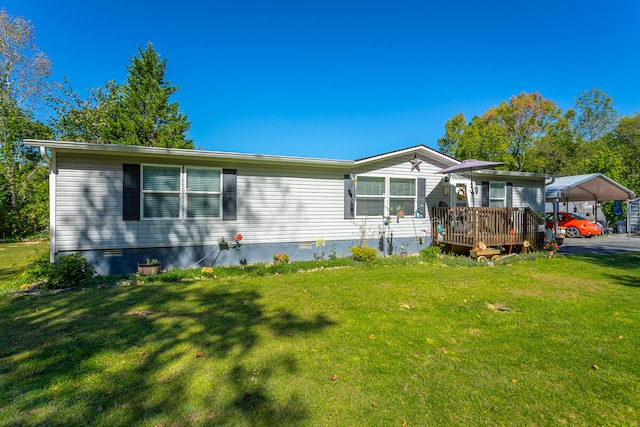 view of front of house featuring a front yard and a wooden deck