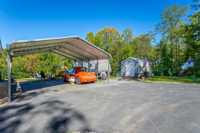 view of vehicle parking featuring a carport