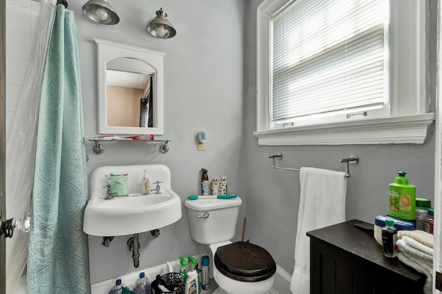 bathroom with sink and toilet