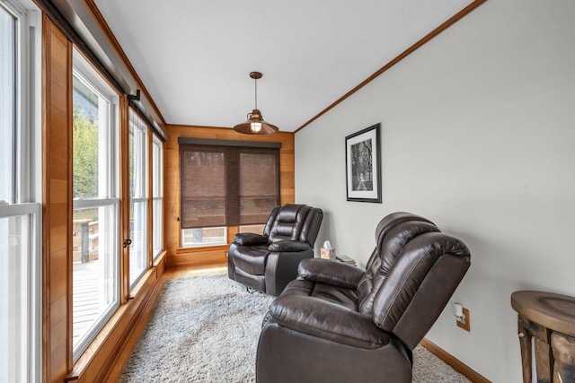 sitting room with ornamental molding